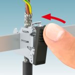 Sistema de conexión rápida de cables apantallados a tierra